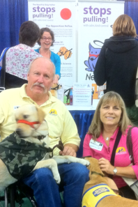 photo of NewTrix booth in San Diego w Canine Companions for Independence